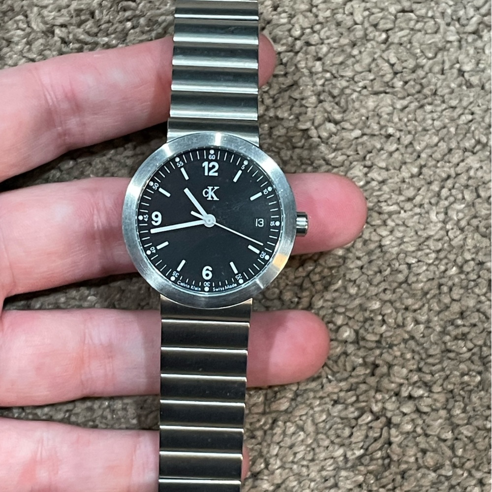Calvin Klein Unisex Watch. Silver band and gray face